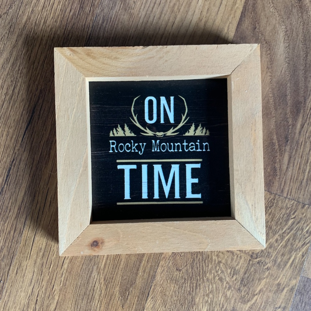 On Rocky Mountain Time Sign